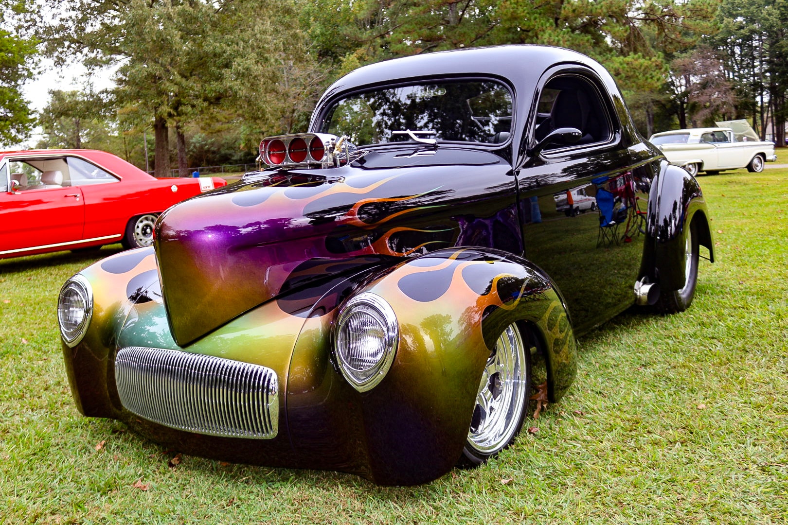 2026 Best in Show — custom Willys coupe with flame paint, 3/4 angle